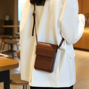 Mála nua ingearach cabhraithe TRUST-U, mála tras-choirp le cuma den scoth agus áisiúil